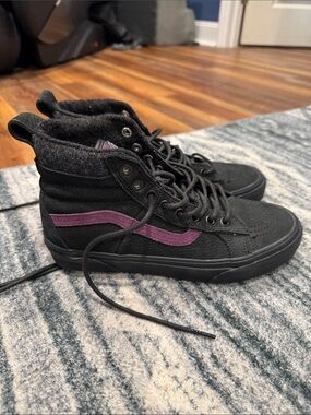Vans High-Top Skate Shoe in Black with Purple Stripe